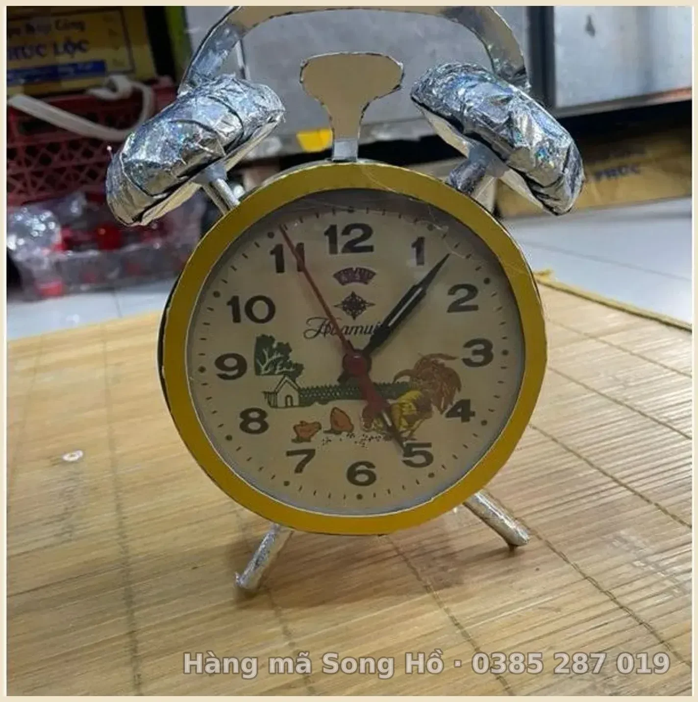 Đồng hồ quả táo vàng mã(đồng hồ báo thức)