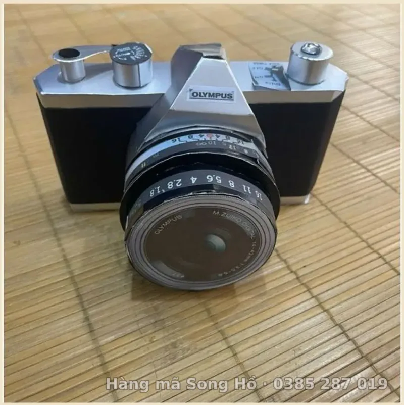 Máy ảnh kỹ thuật số hàng mã bằng giấy.
